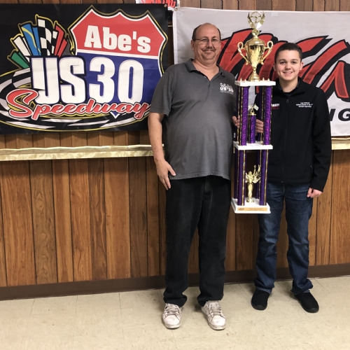 Cade receiving ROY hardware from US 30 track owner Bobby Lincoln. 